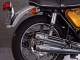 a motorcycle that is parked on the side of the street