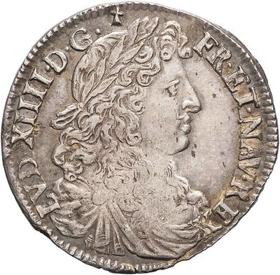 a silver coin with an image of a man on it