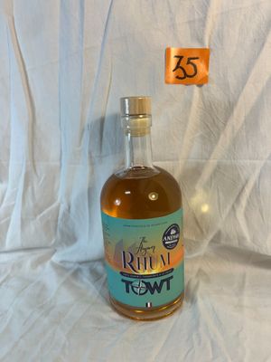 a bottle of liquor that is sitting on a table