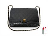 a chanel black quilted leather shoulder bag with gold hardware