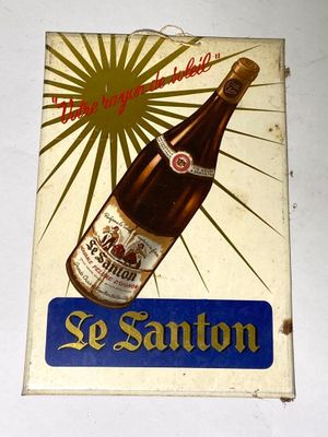 une affiche représentant une bouteille de bière posée sur une table