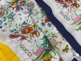 an image of a close up of a scarf with flowers on it