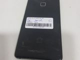 a close up of a cell phone with a barcode on the back