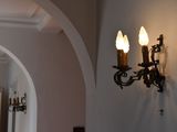 a light that is on on the wall in the room