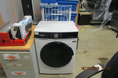 a washer and a dryer sitting in a room