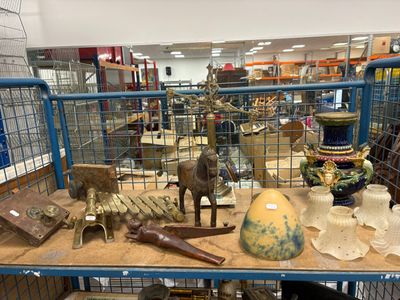 many different items on a shelf in a store