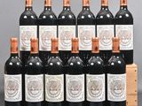 several bottles of red wine are lined up in a row