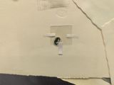 a piece of paper with a cross on it and a piece of paper with a cross on it