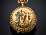 une image représentant une montre de poche en or et émail ornée d'un dragon
