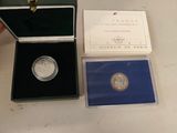 a small box with a coin inside of it on a table