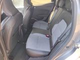 the back seats of a car with a seat belt in a car