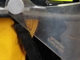 a close up of a fireman ' s helmet with a safety helmet attached to it