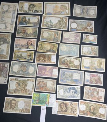 many different types of currency are displayed on a black surface