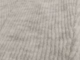an image of a close up of a blanket on a bed