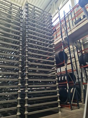 a lot of racks that are stacked up in a building