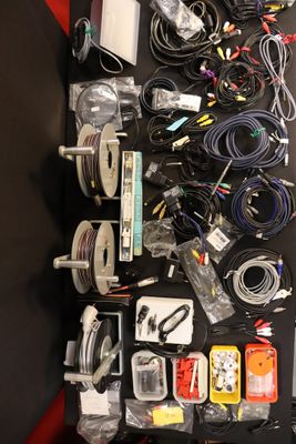 a lot of electronics that are sitting on a table