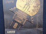 une pancarte sur laquelle est écrit « lampe normana »