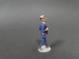 a small figurine of a man in a suit and tie