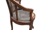 an image of a chair with a cane back and a cane seat