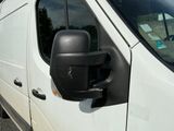 a white van that is parked in the parking lot