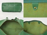 two photos of the inside of a green purse with a zipper