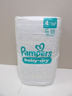 a bag of diapers sitting on top of a toilet