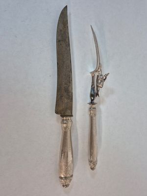 Couvert à gigots en argent fourré 925/1000ème à décor guillo…