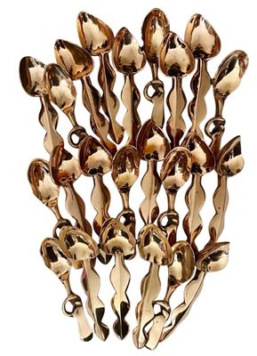 a bunch of spoons that are sitting on a table
