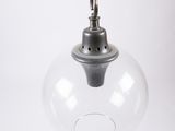 an image of a clear glass pendant light hanging from a chain