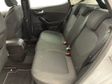 the back seats of a car are clean and ready to be used