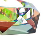 a close up view of a glass bowl with a diamond design on it