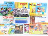 many children ' s books that are on the table