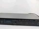 an image of a black amplifier sitting on top of a white table
