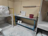 an image of a room with a lot of stuff on the floor