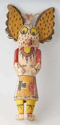 wooden figurine of a woman with wings on her head