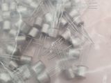 a bunch of silver colored electronic components sitting on a table