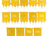 a close up of a number of yellow pennants hanging on a wall