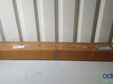 a box of cardboard sitting on top of a white floor