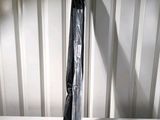 a black and white umbrella on a white table