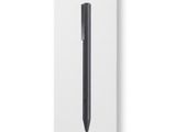 an image of a black pen sitting on top of a white box