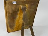 antique brass picture frame with a bird on a stand on a white background