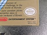 a card with a pen on it that says the adventures of link