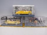 three toy cars that are sitting on top of each other