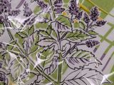 purple flowers on a green and white checkered table cloth