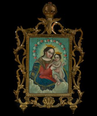 painting of a woman holding a baby in a gold frame