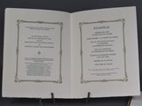 an open book with a picture of a man on it