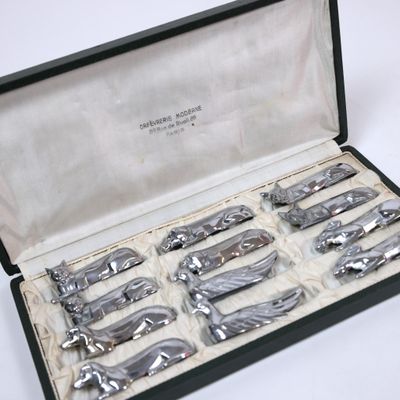 a box with six different types of silverware in it