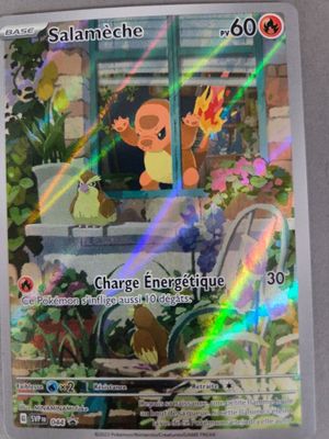 gros plan d'une carte pokemon sur une table