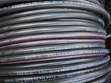 a stack of black hoses stacked on top of each other