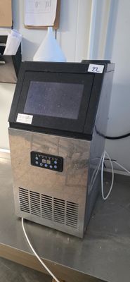 an image of a machine that is sitting on a counter